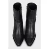 Black leather Cossack boots with a stacked heel