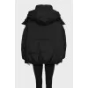 Reversible black down jacket with signature print