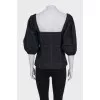 Black top with puff sleeves