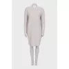 Knitted white dress with long sleeves