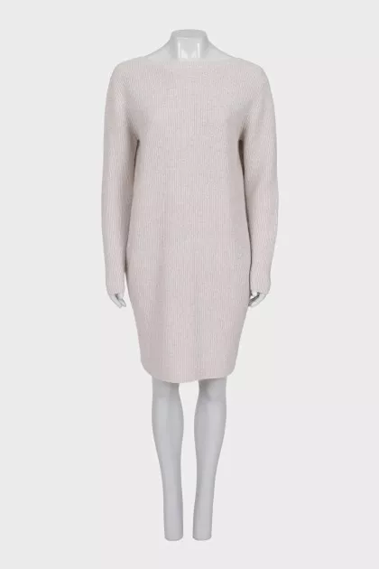 Knitted white dress with long sleeves