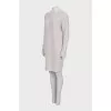 Knitted white dress with long sleeves