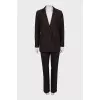 Brown suit with checkered trousers