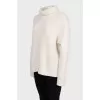 White turtleneck sweater