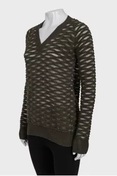Pullover with shiny thread