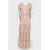 Evening dress with beads with tag