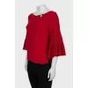 Red jumper with crystals
