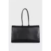 Leather tote bag with signature clochette