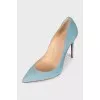 Blue suede pumps with tag