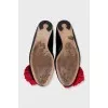 Patent leather ballet flats decorated with a flower