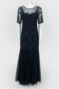 Evening dress with a skirt-year with lace and beads