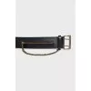 Leather belt decorated with a chain