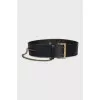 Leather belt decorated with a chain