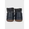 Suede boots decorated with lacing