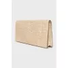 Textured leather clutch with magnetic closure