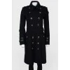 Double -breasted coat with metal buttons