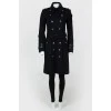 Double -breasted coat with metal buttons