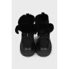 Insulated black boots with a massive sole