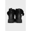 Insulated black boots with a massive sole