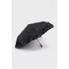 Black umbrella with a patch