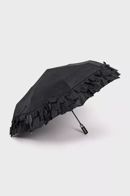 Black umbrella with a patch