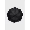 Black umbrella with a patch