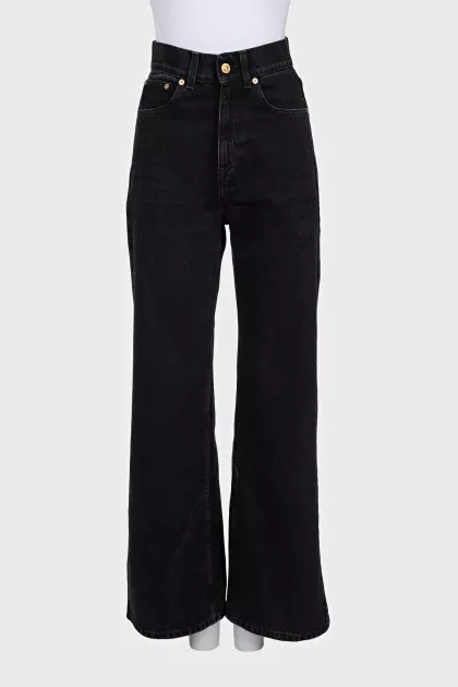 Wide-leg black jeans with gold hardware