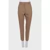 Brown tapered trousers with creases