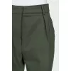Green tapered trousers with creases