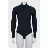 Black bodysuit with a skull on the back