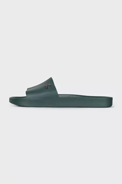Green flip-flops with a metallic logo