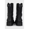 Black boots with branded embossing