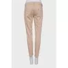 Low-waisted tapered trousers