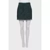 Mini skirt decorated with fringe