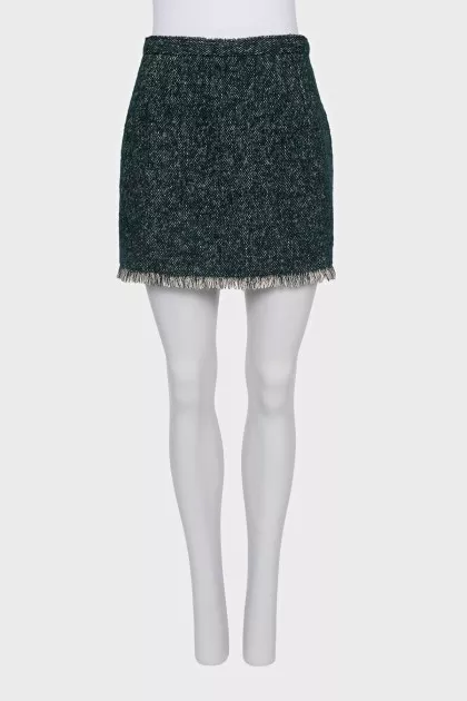 Mini skirt decorated with fringe
