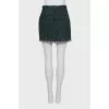 Mini skirt decorated with fringe