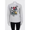 Sweatshirt with a signature print on the front