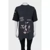 Black T-shirt with a distressed effect