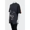 Black T-shirt with a distressed effect