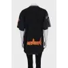 Black T-shirt with a distressed effect