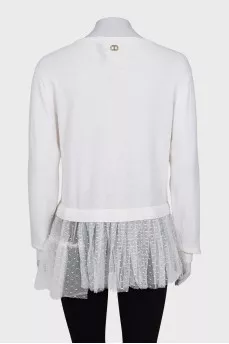 Jumper decorated with a transparent frill