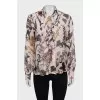 Semi-sheer printed tie-up blouse