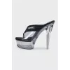 Black platform sandals with a combination of heels