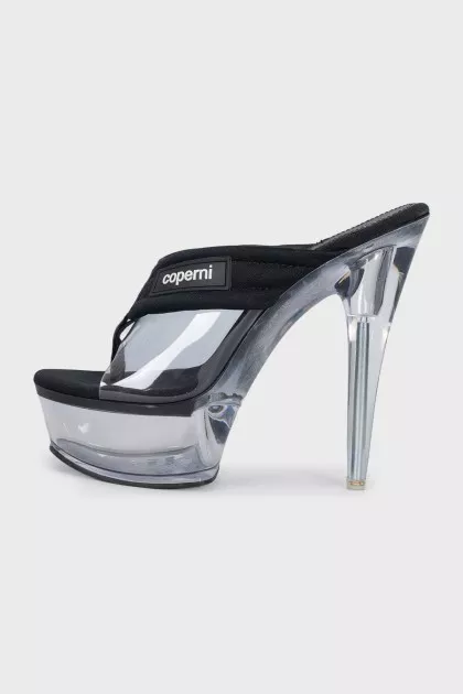 Black platform sandals with a combination of heels