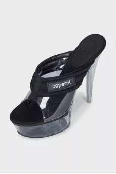 Black platform sandals with a combination of heels