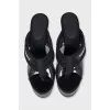 Black platform sandals with a combination of heels