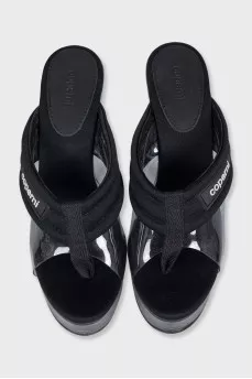 Black platform sandals with a combination of heels