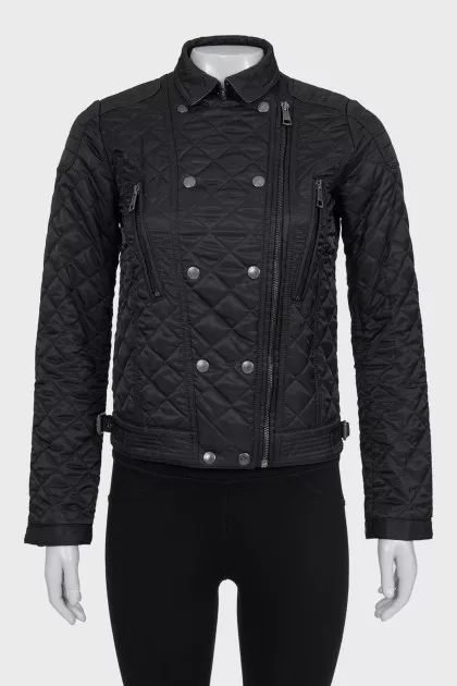 Quilted jacket with a diagonal fastening