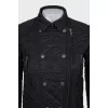 Quilted jacket with a diagonal fastening