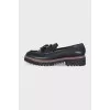 Black tassel loafers